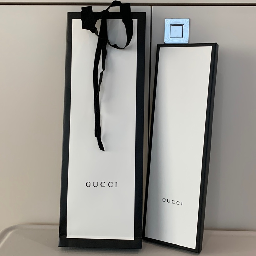 Gucci box and shopping bag